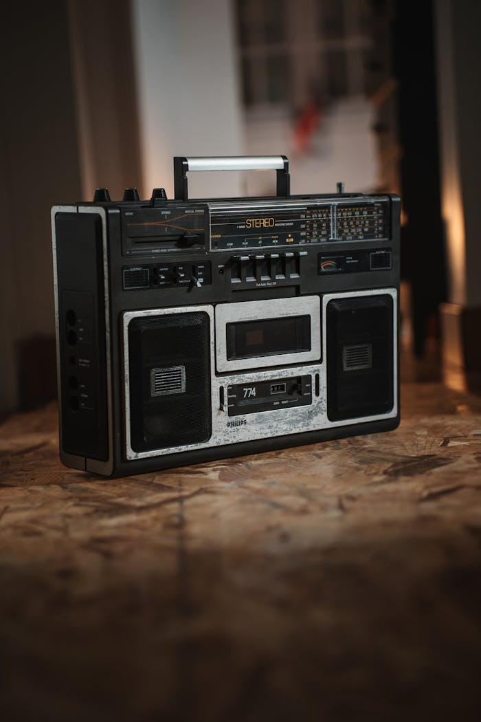 about-us Classic vintage boombox with cassette player, perfect for retro music lovers.